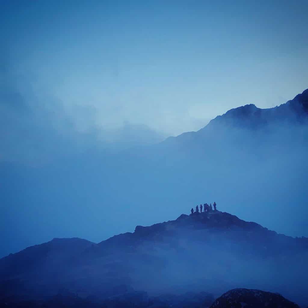 Trainees above the clouds in the early evening, at HMI Base Camp